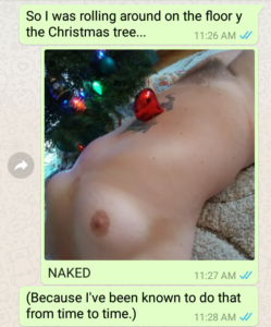text message containing nude photo of woman reclining under Christmas tree