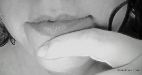 close-up of woman's mouth in a contemplative expression