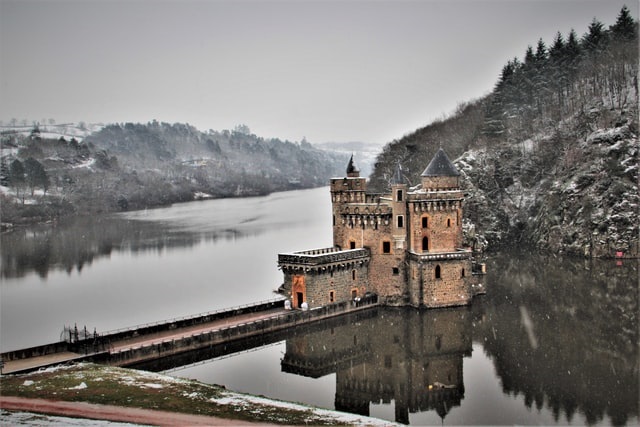 castle with surrounding moat -- image via unsplash