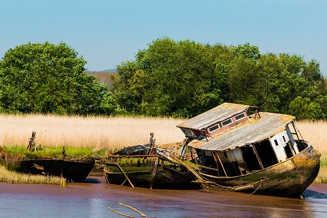 photo of three broken wood boats from Pixabay