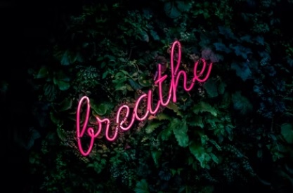 'breathe' neon sign via Unsplash!