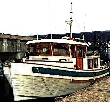 small trawler style "tug" boat against wooden dock